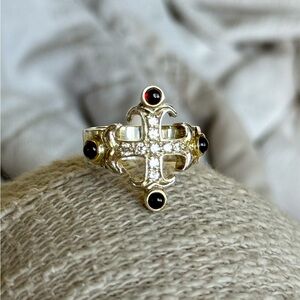 Elegant Gold and Garnet Cross Ring